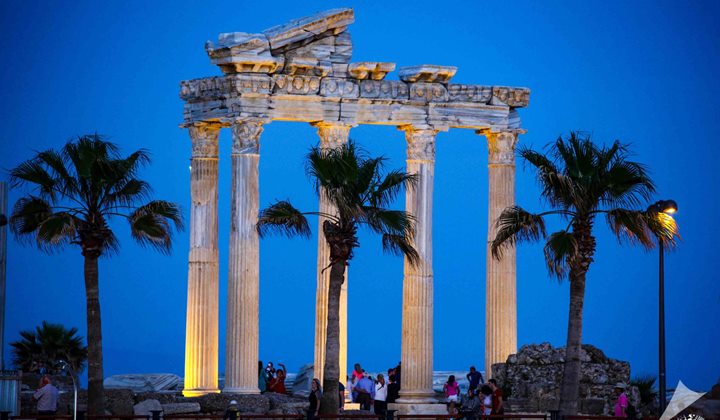 Side ancient temple and palm trees on the Antalya coast